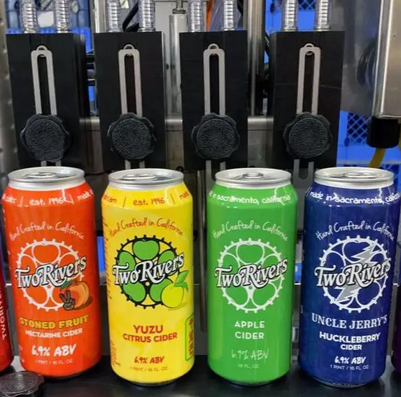 Two Rivers Cider image of Cider flavors available in cans.